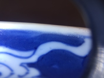 A Chinese blue and white bowl with a river scene, Kangxi