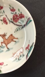 A pair of Chinese famille rose cups and saucers with deer, Yongzheng, 1723-1735