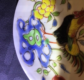 A pair of Chinese famille rose cups and saucers with roosters, Yongzheng, 1723-1735