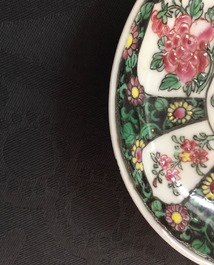 A Chinese famille noire cup and saucer, Yongzheng, 1723-1735