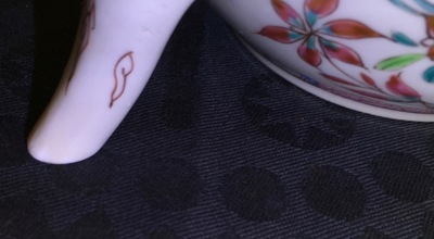 A Chinese famille rose teapot and cover, Yongzheng/Qianlong