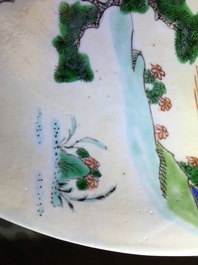 A rare Chinese famille verte caf&eacute; au lait ground landscape dish, Kangxi