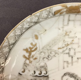 A pair of Chinese grisaille and gilt eggshell cups and saucers with Europeans, Yongzheng, 1723-1735