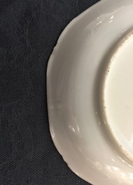 A Chinese semi-eggshell cup and saucer with quails, Yongzheng/Qianlong