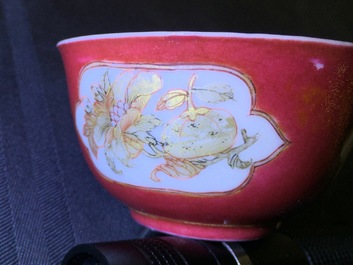 A Chinese eggshell ruby ground cup and saucer, Yongzheng, 1723-1735