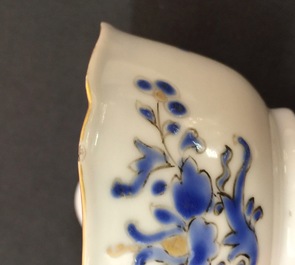 A set of 8 Chinese overglaze blue and gilt cups and saucers, Yongzheng, 1723-1735