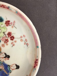 Een Chinese famille rose eierschaal kop en schotel met een tuinsc&egrave;ne, Yongzheng, 1723-1735