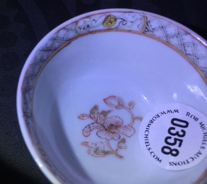 A Chinese eggshell ruby ground cup and saucer, Yongzheng, 1723-1735