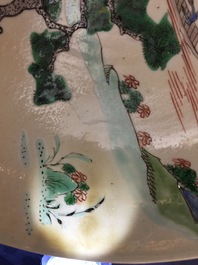 A rare Chinese famille verte caf&eacute; au lait ground landscape dish, Kangxi