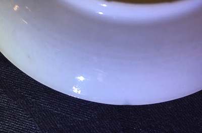 A Chinese famille rose eggshell cup and saucer with a cat, Yongzheng, 1723-1735