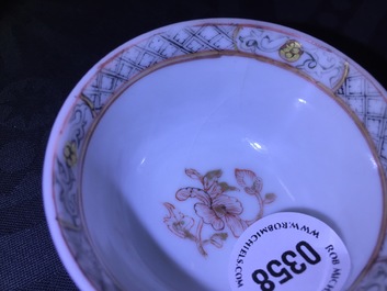 A Chinese eggshell ruby ground cup and saucer, Yongzheng, 1723-1735