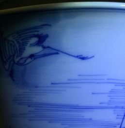 A Chinese blue and white bowl with a river scene, Kangxi