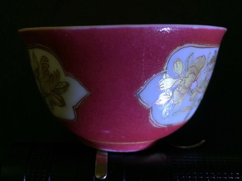 A Chinese eggshell ruby ground cup and saucer, Yongzheng, 1723-1735