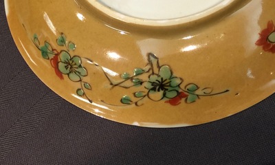 A Chinese famille verte caf&eacute; au lait ground cup and saucer, Kangxi