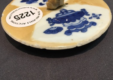 A Chinese blue and white on caf&eacute; au lait ground teapot and cover, Kangxi
