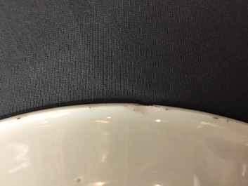 A large Chinese blue and white floral charger and two plates, Kangxi