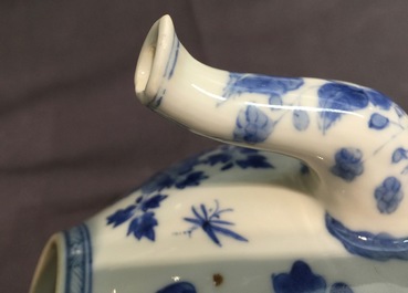 A large Chinese blue and white teapot and cover with peacocks, Kangxi