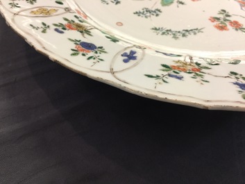 A large Chinese famille verte dish with a botanical garden, Kangxi