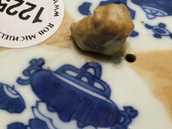 A Chinese blue and white on caf&eacute; au lait ground teapot and cover, Kangxi