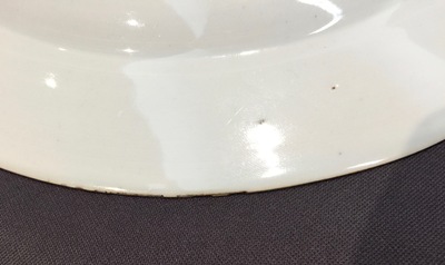 A fine Chinese famille rose plate with butterflies on the rim, Yongzheng, 1723-1735