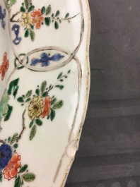 A large Chinese famille verte dish with a botanical garden, Kangxi
