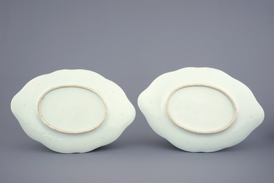 A pair of Chinese famille verte tureens and covers on stands, 19th C.