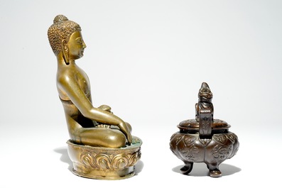 A Chinese gilt bronze Buddha and a small bronze censer with cover, 19th C.