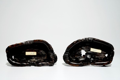 A pair of Chinese famille rose dog-shaped candle holders, 18/19th C.