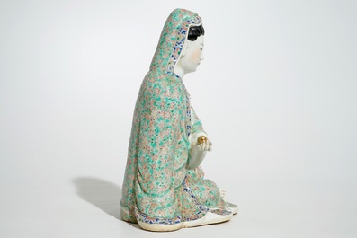 A Chinese famille rose model of a seated Guanyin, 19th C.