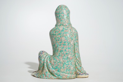 A Chinese famille rose model of a seated Guanyin, 19th C.