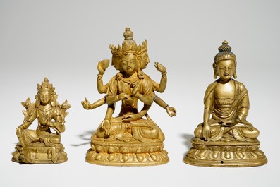 A set of three Chinese gilt bronze figures of Tara and Buddha, 18/19th C.