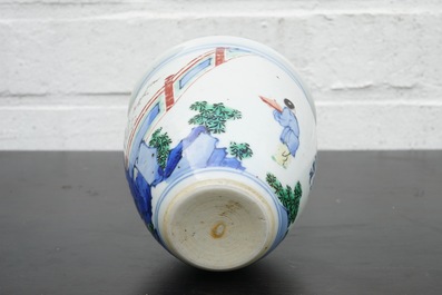 A Chinese wucai brush pot on wooden stand, Transitional period