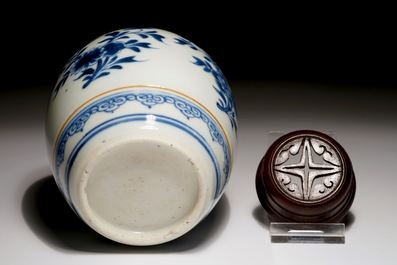 A Chinese blue and white jar with wooden cover, Kangxi