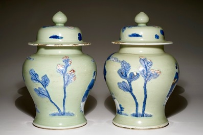 A pair of Chinese celadon, copper-red and underglaze blue vases and covers, Kangxi