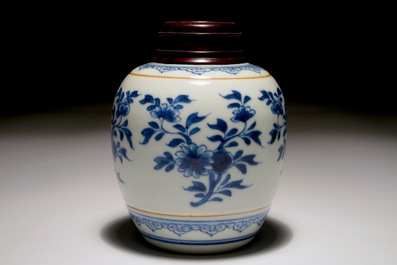 A Chinese blue and white jar with wooden cover, Kangxi