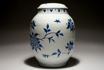 A Chinese blue and white ovoid jar and cover with floral sprigs, Transitional period, Chongzhen