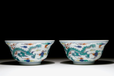 A pair of Chinese doucai "dragon" bowls, Yongzheng mark, 20th C.