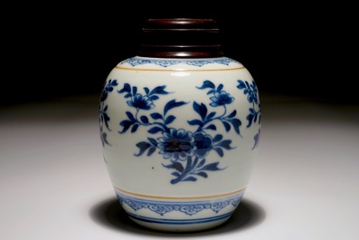 A Chinese blue and white jar with wooden cover, Kangxi