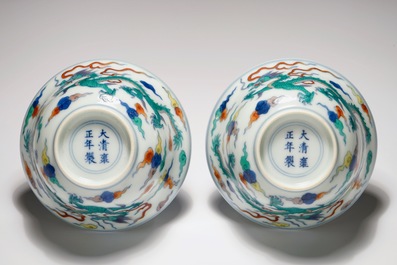 A pair of Chinese doucai "dragon" bowls, Yongzheng mark, 20th C.