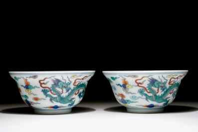 A pair of Chinese doucai "dragon" bowls, Yongzheng mark, 20th C.