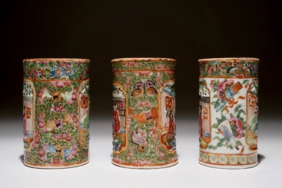 Three Chinese Canton rose medallion relief-decorated and pierced brushpots, 19th C.