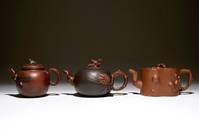 A set of three Chinese Yixing teapots, 20th C.