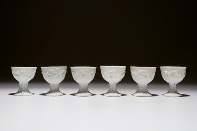 Six Chinese blanc de Chine stem cups with applied floral sprigs, 18/19th C.