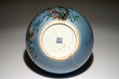 A Chinese famille rose blue ground tianqiuping &ldquo;Nine peaches&rdquo; vase, 19/20th C.