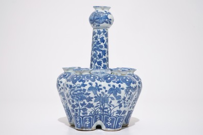 A Chinese blue and white tulipiere and a fan-shaped plaque, 19th C.