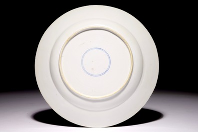 A polychrome Chinese "South Sea bubble" plate with a harlequin, Kangxi/Yongzheng