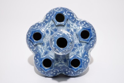 A Chinese blue and white tulipiere and a fan-shaped plaque, 19th C.