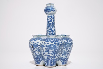 A Chinese blue and white tulipiere and a fan-shaped plaque, 19th C.