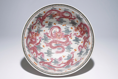 A large Chinese famille rose "dragon" bowl on a wooden stand, 20th C.