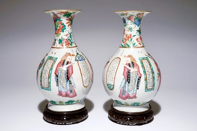 A pair of Chinese famille rose "Wu Shuang Pu" vases, 19th C.